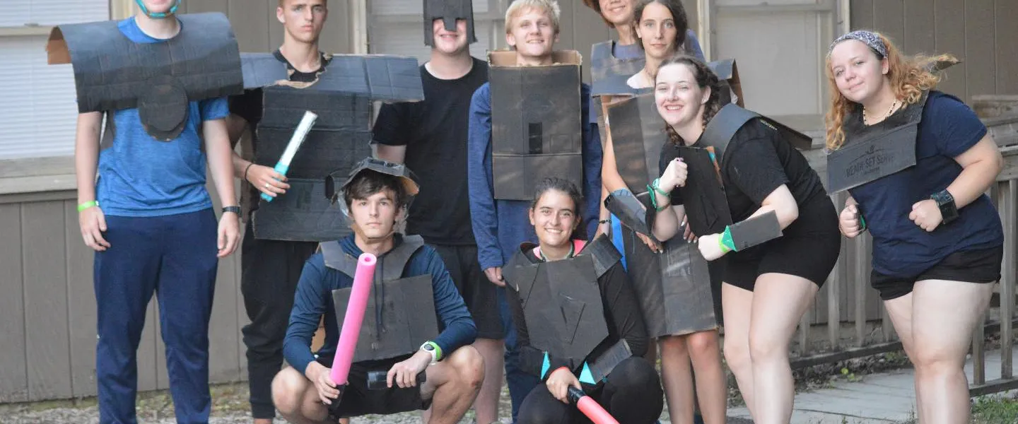 A group of teens dressed up