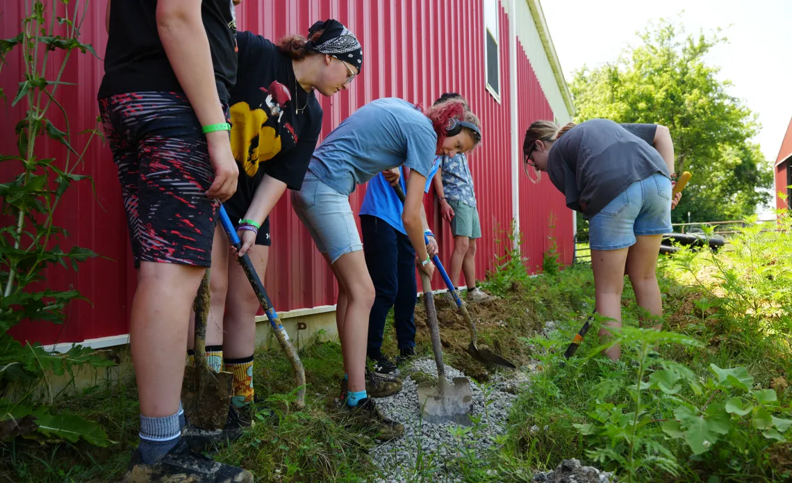 A group of teens in Crew Service camp