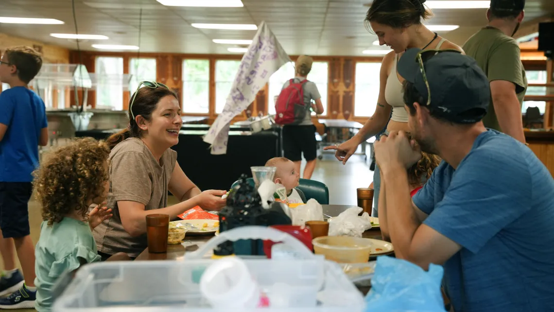 A family at lunch at Family Camp