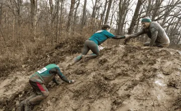 A family at the arctic dash in the mud